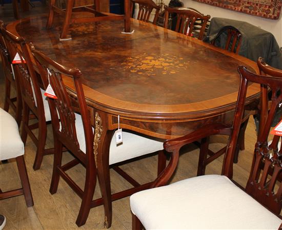 A Louis XVI style walnut and marquetry extending dining table 300cm extended